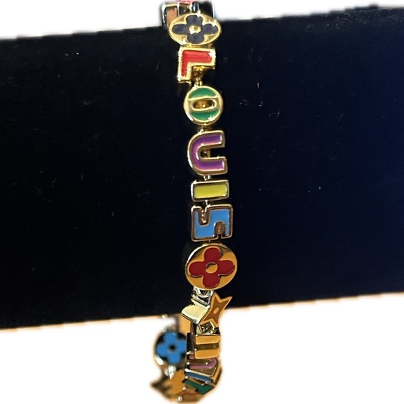 Louis Vuitton colored gold Logo Bracelet - Picture 1 of 4